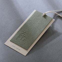 Embossed hang tag